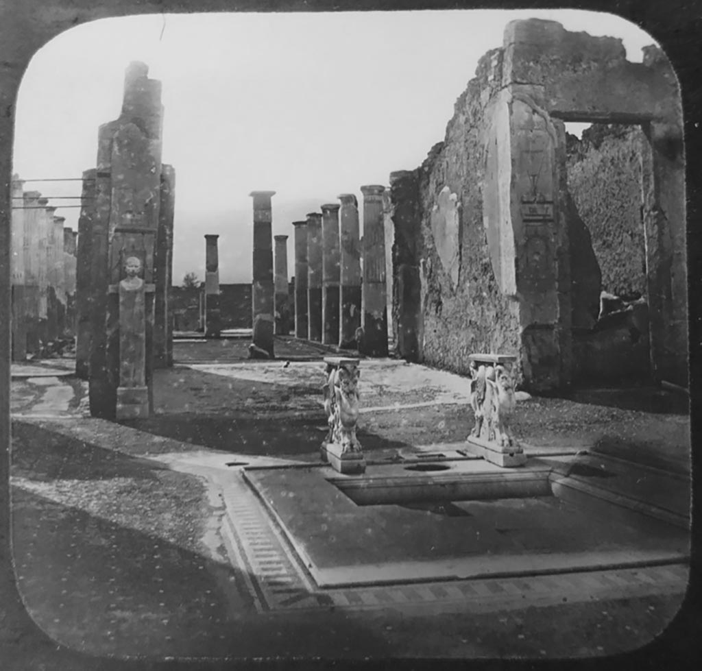 VIII.4.15 Pompeii. c.1900. 
C. and G. Lantern slide published by A. Laverne. Looking south-west across impluvium towards west wall of tablinum.
