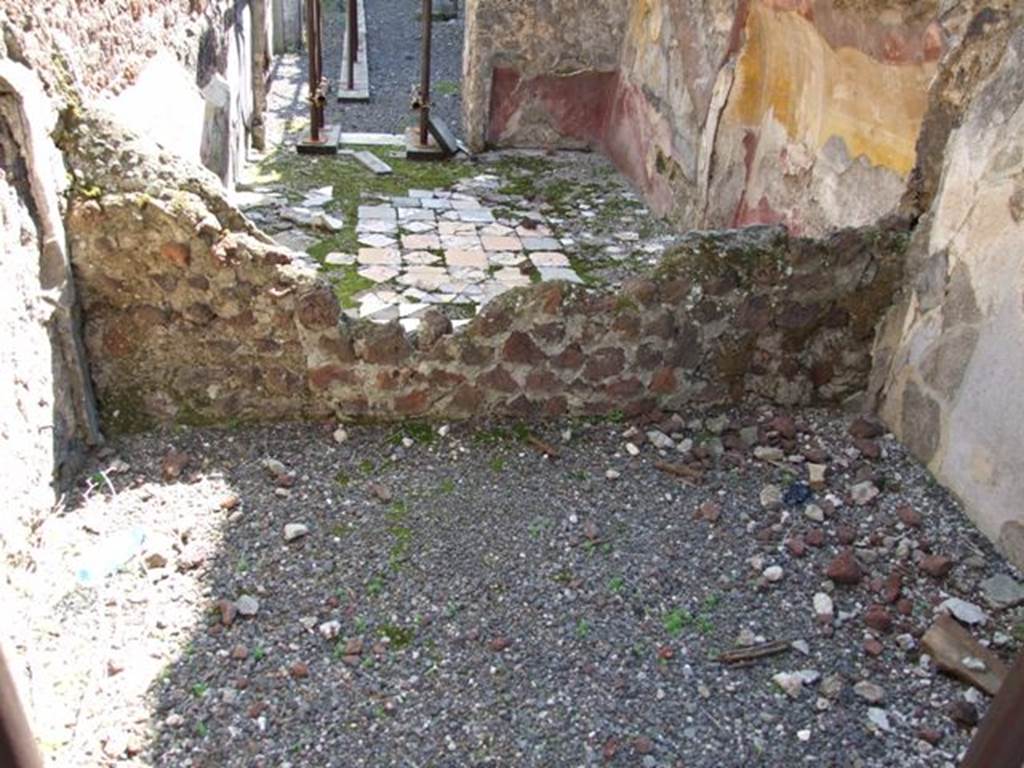 VIII.4.15 Pompeii. March 2009. Room 7, a small room or cupboard in foreground.   Room 18 is beyond the ruined wall. Looking south.
