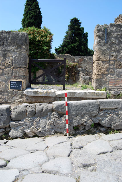VIII.7.24 Pompeii. September 2010. East side of atrium with entrance doorway, looking towards Via Stabiana. Photo courtesy of Drew Baker.