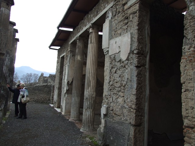 IX.1.20 Pompeii. December 2007. Room 2. Atrium west side. Figured capital from south western corner consisting of a full figure relief of satyrs and bacchantes.