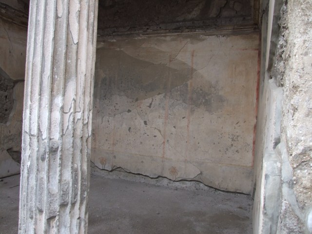 IX.1.20 Pompeii. December 2007. Room 2. Atrium, West Side. Figured capital from north western corner consisting of a full figure relief of satyrs and bacchantes.