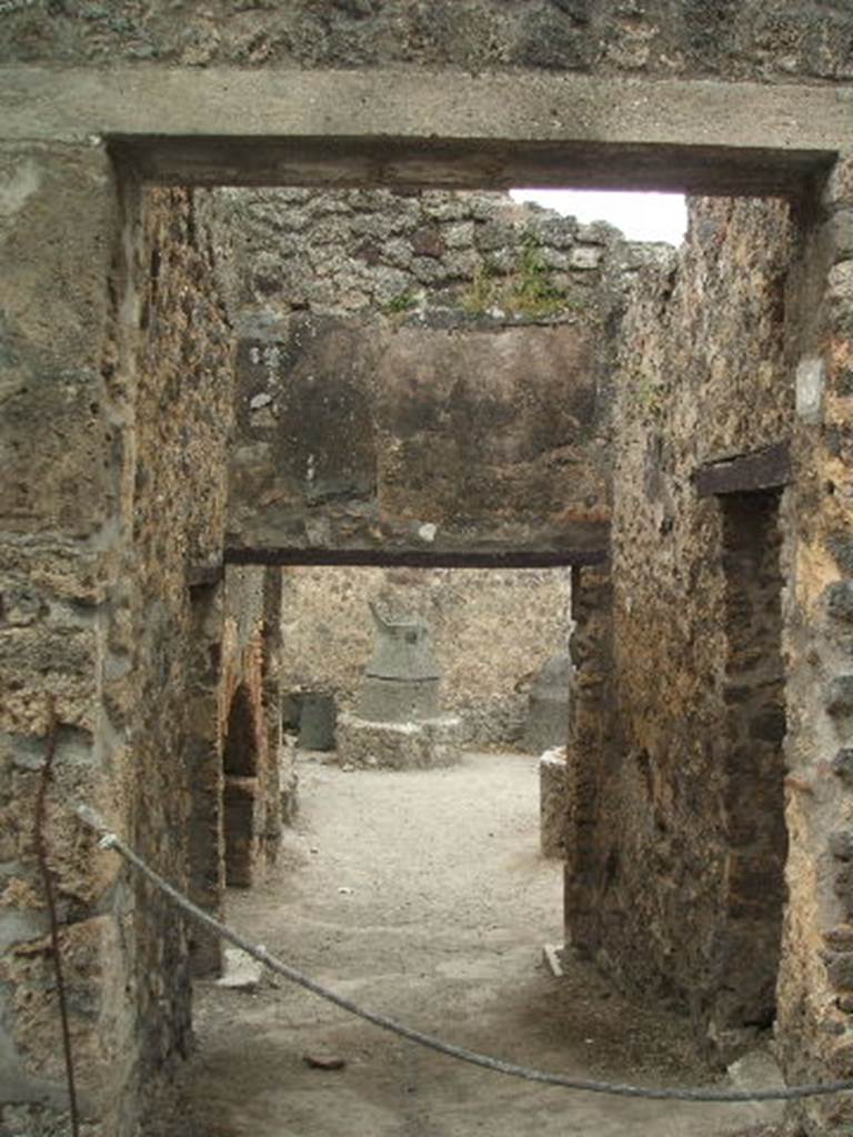 IX.1.33 Pompeii. May 2005. Looking south into bakery, from entrance.