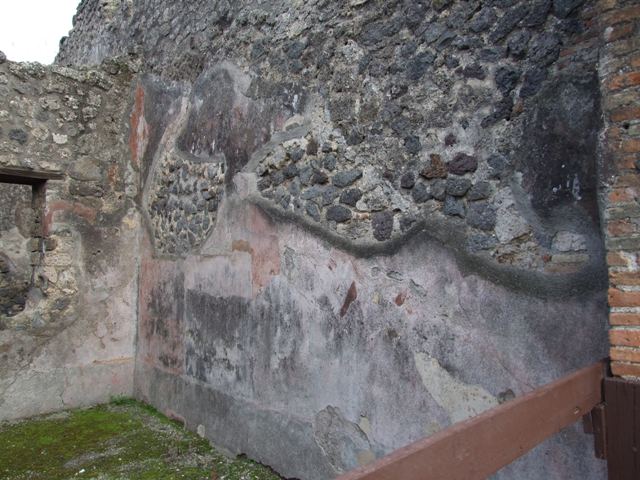 IX.2.12 Pompeii. September 2005. Looking east through rear door towards steps to upper floor.