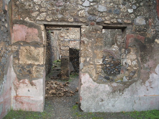 IX.2.12 Pompeii. December 2007. Doorway in east wall to rear rooms.