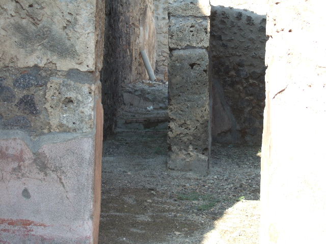 IX.2.12 Pompeii. December 2007. Looking east across shop, with niche in north wall.