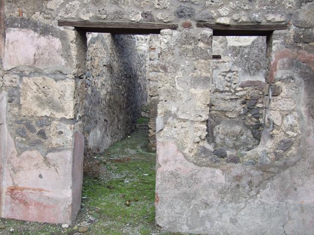 Street altar on SW side of IX.2.12 on Vicolo di Balbo looking east from Via Stabiana.