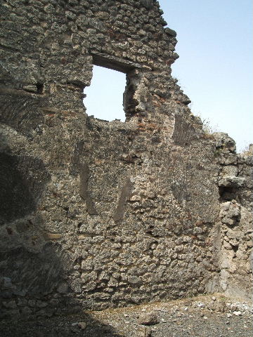 IX.6.3 Pompeii. May 2005. Doorways to two rooms on north side of atrium.