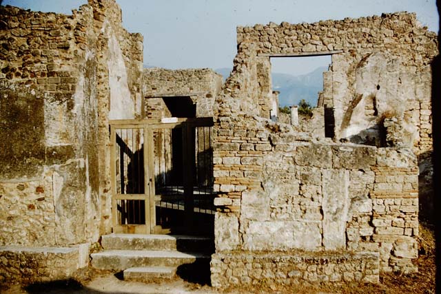 IX.8.6 Pompeii. Entrance mosaic.  Photographed 1970-79 by Günther Einhorn, picture courtesy of his son Ralf Einhorn.
