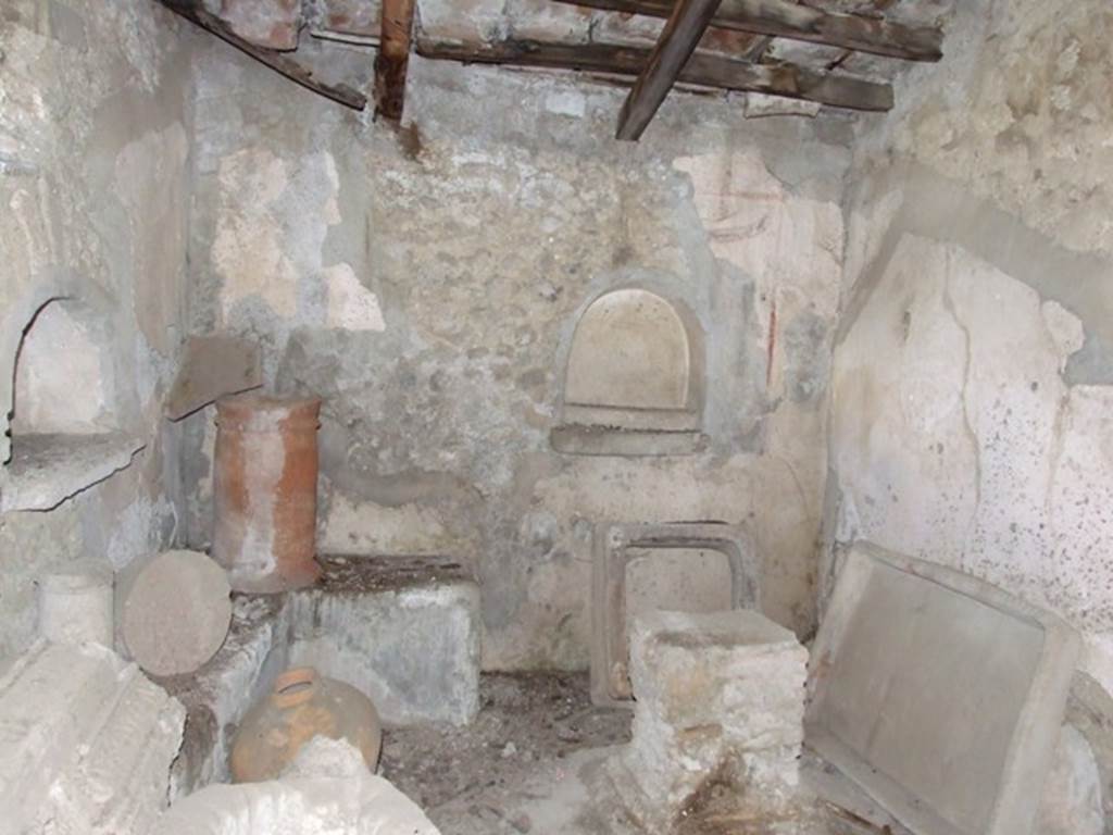 IX.9.10 Pompeii.  March 2009.  Sacellum, or former kitchen.  Looking east. Room with three niches and an altar with a masonry bench along the north wall and the north east corner. See Boyce G. K., 1937. Corpus of the Lararia of Pompeii. Rome: MAAR 14.  (459, PL 41,1)