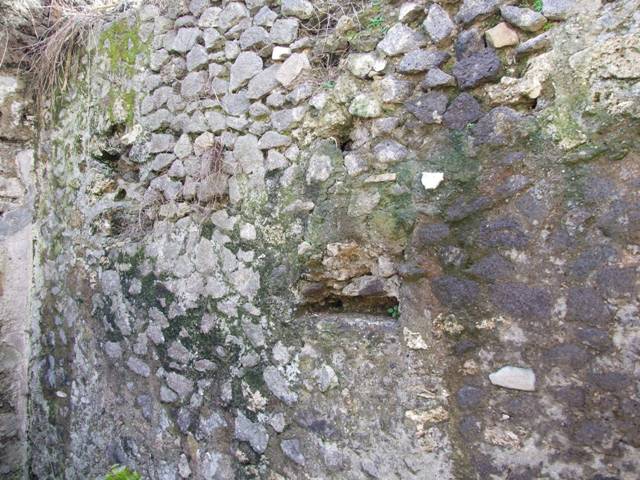 IX.9.g Pompeii. March 2009. North-west corner of atrium, on north side of entrance doorway.