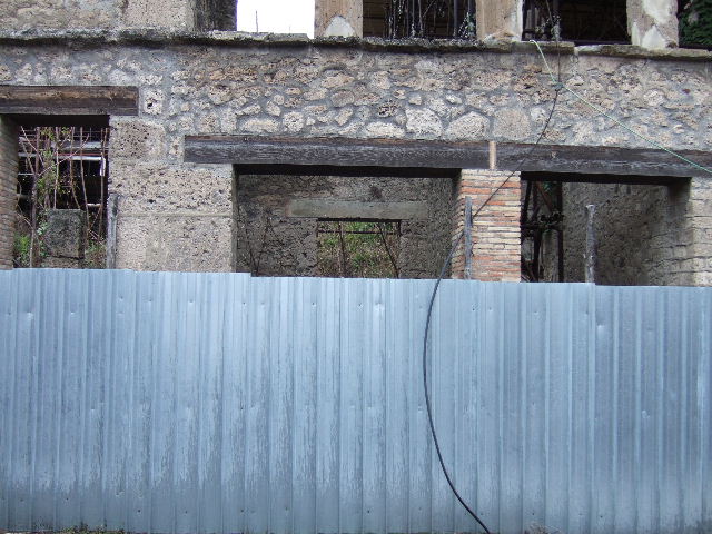 IX.12.5, IX.12.4 and IX.12.3, Pompeii. March 2009. Showing rear view of upper terrace, and partly excavated rooms below.