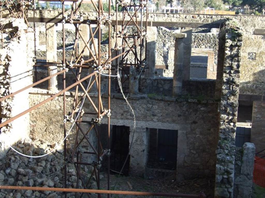 IX.12.4 and IX.12.3 Pompeii. March 2009. Taken from the rear. Looking south to rear of terrace, and rooms below, with door to IX.12.2 (Steps to upper floor) on right.