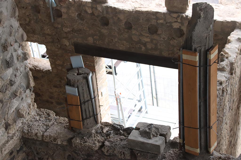 IX.12.5 Pompeii. October 2024. Looking south towards interior of doorway to shop-room. Photo courtesy of Klaus Heese.