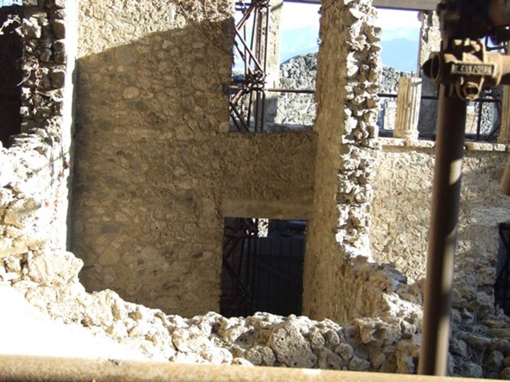IX.12.5 Pompeii. March 2009. Looking south through doorway, from rear.