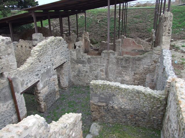 IX.14.b Pompeii. May 2005. Room in south west corner of IX.14.4.
Doorway leading to room with entrance, now blocked.