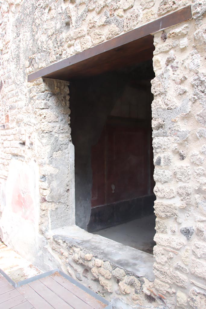 Villa of Diomedes, Pompeii. October 2023. 
Looking north through window in east wall of portico. Photo courtesy of Klaus Heese.
(Villa Diomedes Project – area 57).
(Fontaine, room 5,10).
