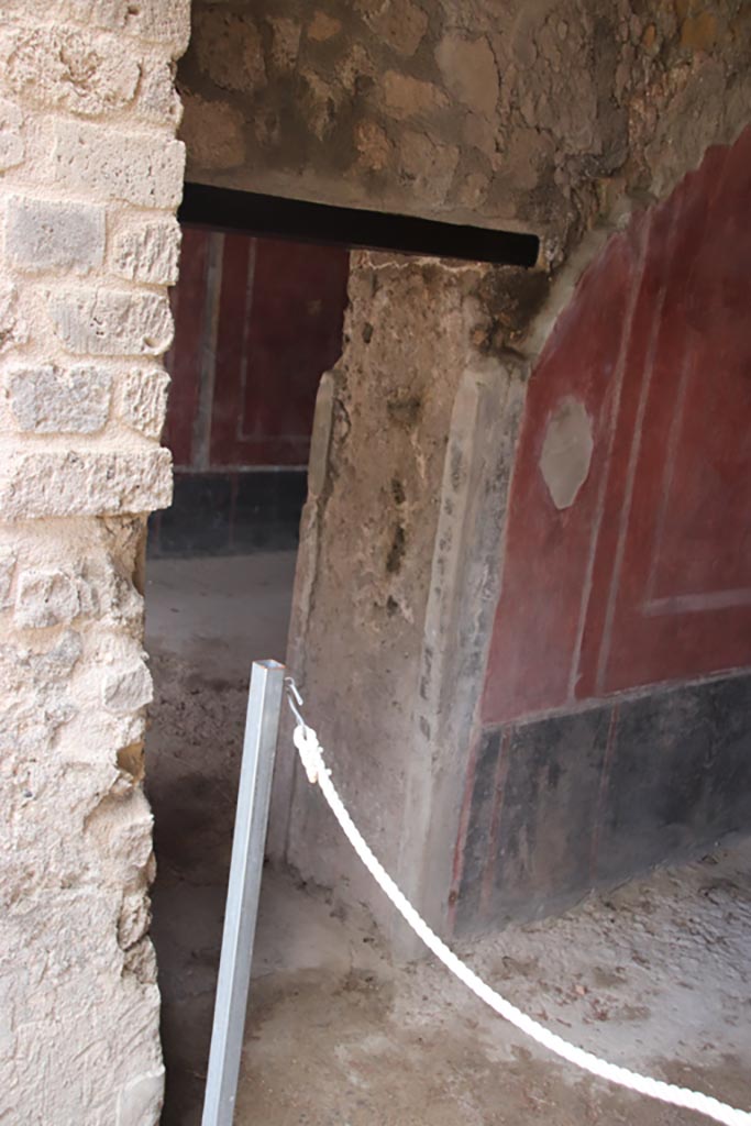 Villa of Diomedes, Pompeii. October 2023. 
Doorway at west end of north wall into next room. Photo courtesy of Klaus Heese.
(Villa Diomedes Project – area 56).
[Fontaine room 5.8 with doorway into 5,10]

