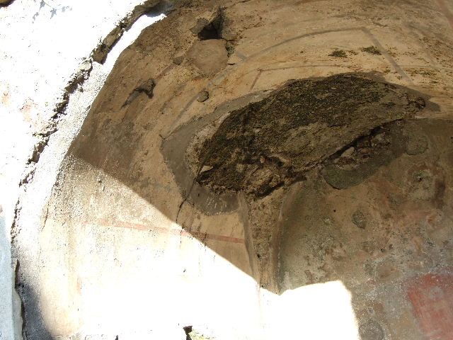 HGE12 Pompeii. December 2006. Staircase against east wall of courtyard with lararium.  