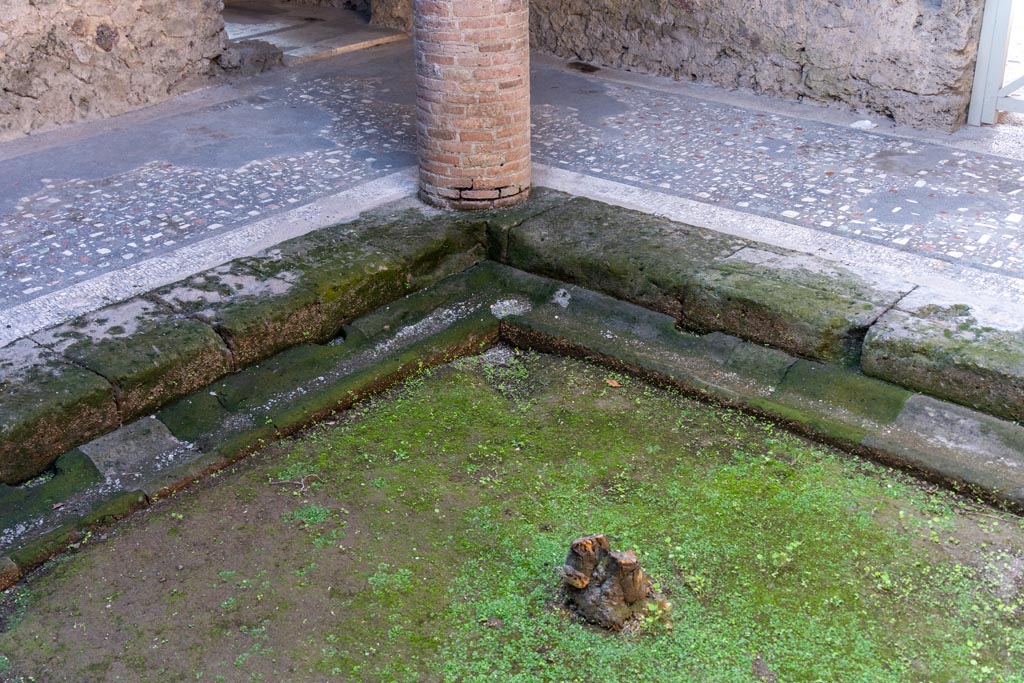 Villa of Mysteries, Pompeii. October 2023. Looking towards south-west corner of impluvium, with gutter. Photo courtesy of Johannes Eber.