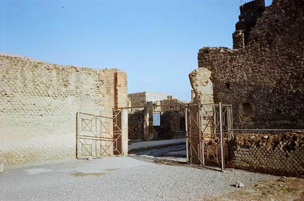 Via Marina, looking north through gates of Temple of Venus towards VII.7.  The alleyway between the Basilica and Temple of Venus is on the right of the picture.   Photo courtesy of Rick Bauer.   January 2010.
