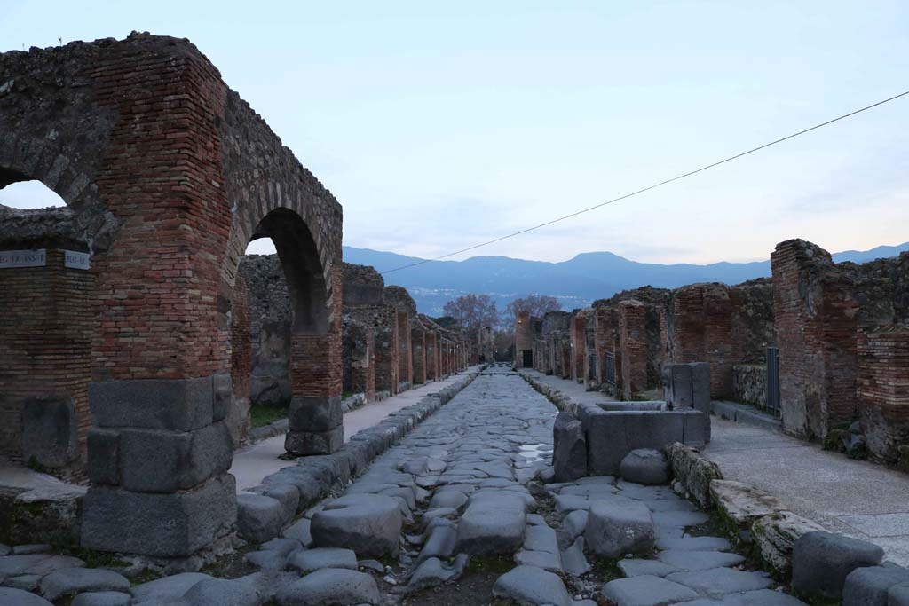 Via Stabiana, at IX.2.1, Pompeii, on left. December 2018. 
Looking south between IX.2, on left, and VII.1, on right, from crossroads with Via degli Augustali (on right) and unnamed vicolo (on left). 
Photo courtesy of Aude Durand.


