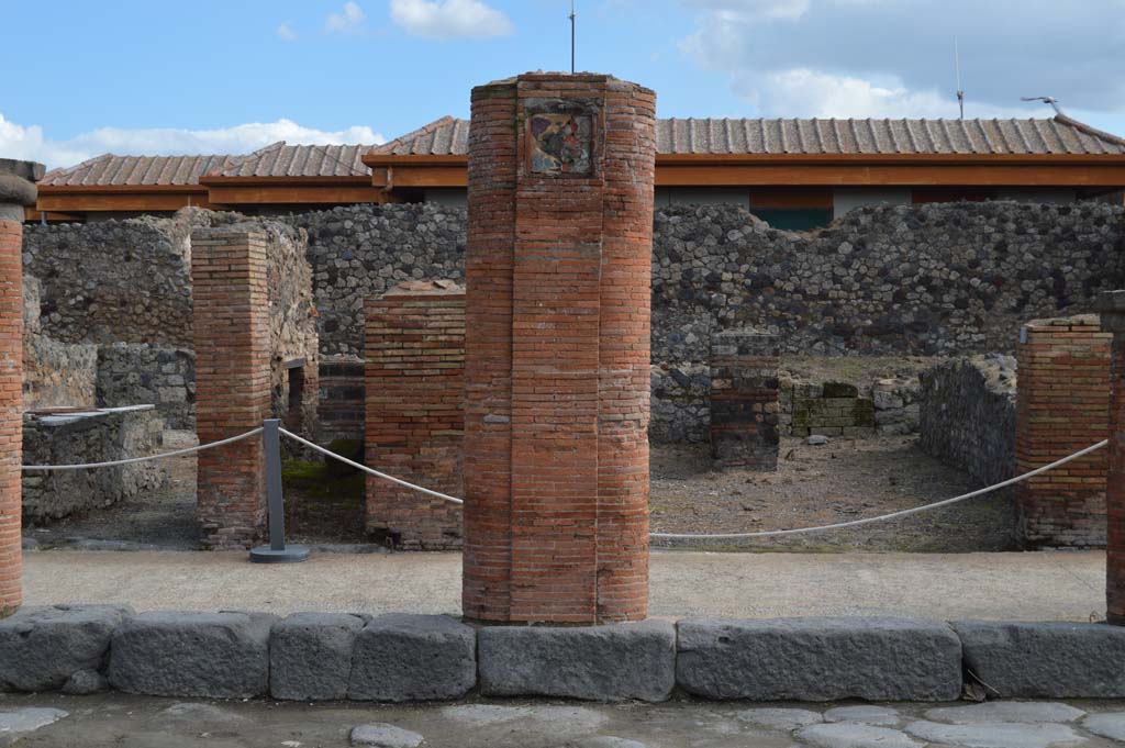Via del Foro, east side, Pompeii. March 2018. 
Looking east to seventh pilaster/column from south end, outside VII.4.6, at rear, behind portico.
Foto Taylor Lauritsen, ERC Grant 681269 DCOR.
