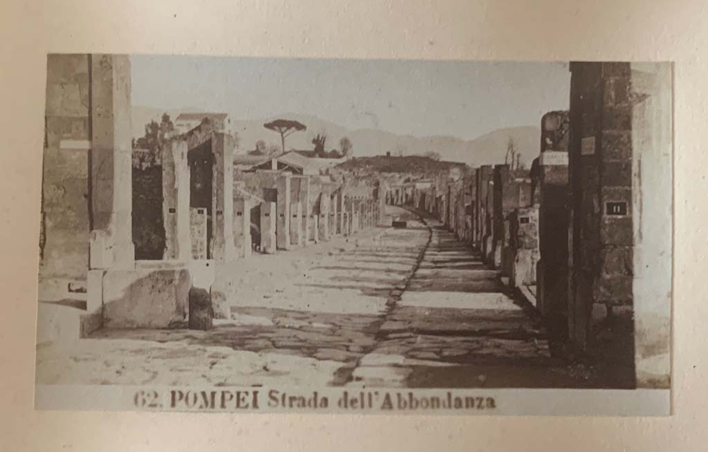 Via dell’ Abbondanza, Pompeii. From an album dated 1882. Looking east between VII.9 and VIII.3.
Photo courtesy of Rick Bauer.
