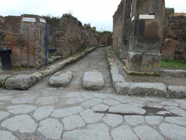 Via della Fortuna. May 2005. Looking east across wheel ruts between VI.14 and VII.3 from near VII.3.6.