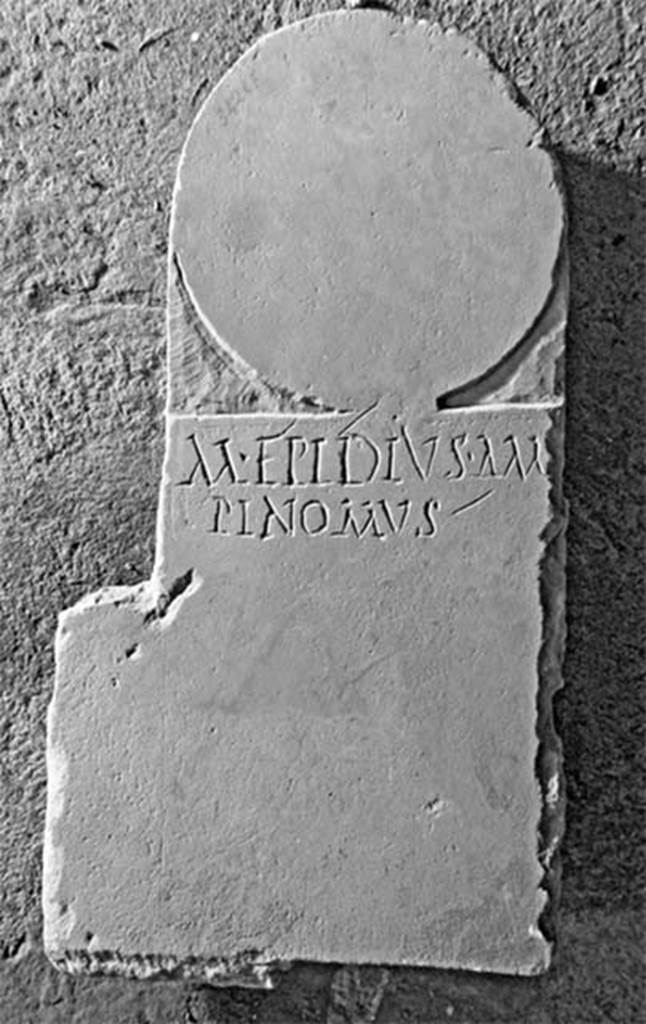 Pompeii Fondo Azzolini. Tomb 5: Marcus Epidius Ampinomus.
Columella with inscription
M EPIDIUS AM
PINOMUS

M(arcus) Epidius Ampinomus

See Notizie degli Scavi di Antichit, 1916, 303, t5.
Photo  Umberto Soldovieri.