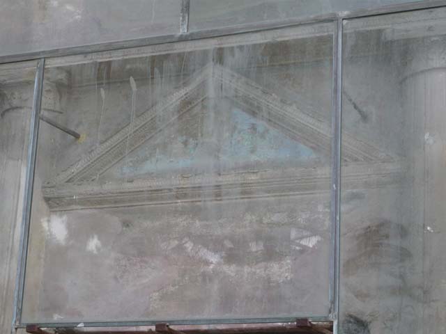 Pompeii Porta Nocera. Tomb 19ES. West side of doorway, remains of painted plaster. May 2010.