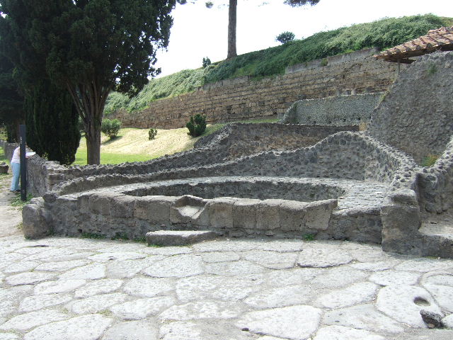 Pompeii, outside Porta Nocera. July 2010. Plaster cast of a fourth fleeing victim, found in 1956/7. Photo courtesy of Rick Bauer.