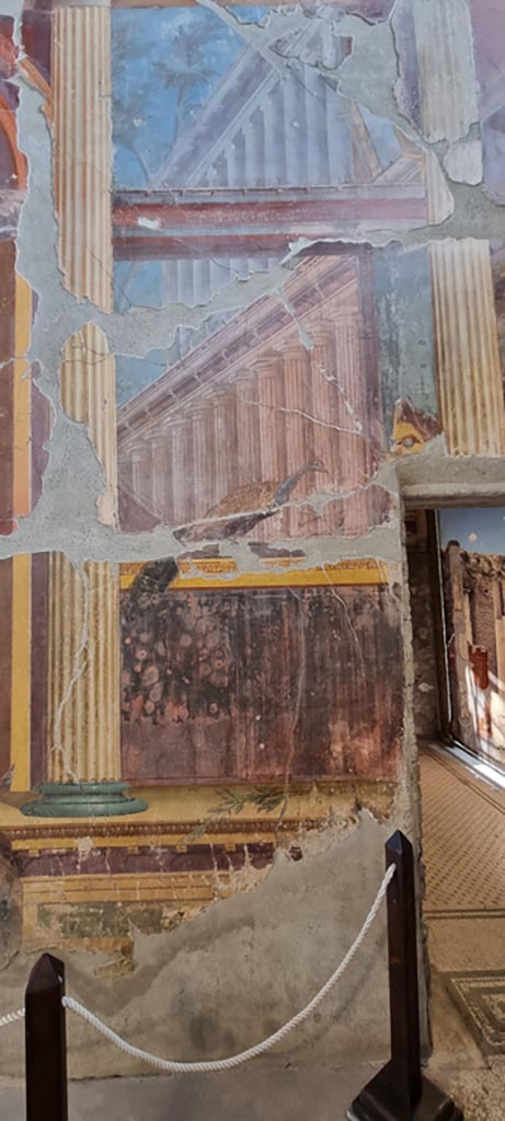 Oplontis, Villa of Poppea, January 2023.
Room 15, painted peacock and tragic mask, from south end of east wall. 
Photo courtesy of Miriam Colomer.
