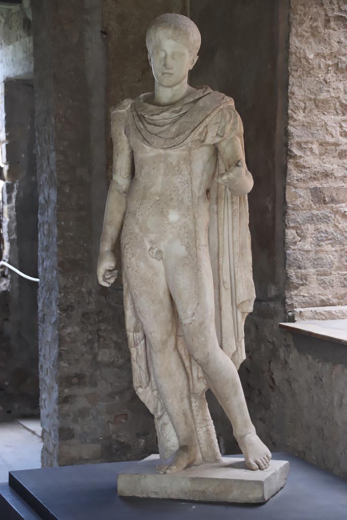 Villa of Poppaea, Oplontis, October 2023.
Room 65, marble statue of Ephebus on display here, but found on east side of pool.
Photo courtesy of Klaus Heese. 
