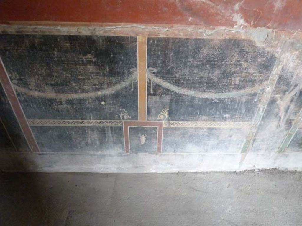 Oplontis, September 2015. Room 66, black zoccolo at south end of west wall.