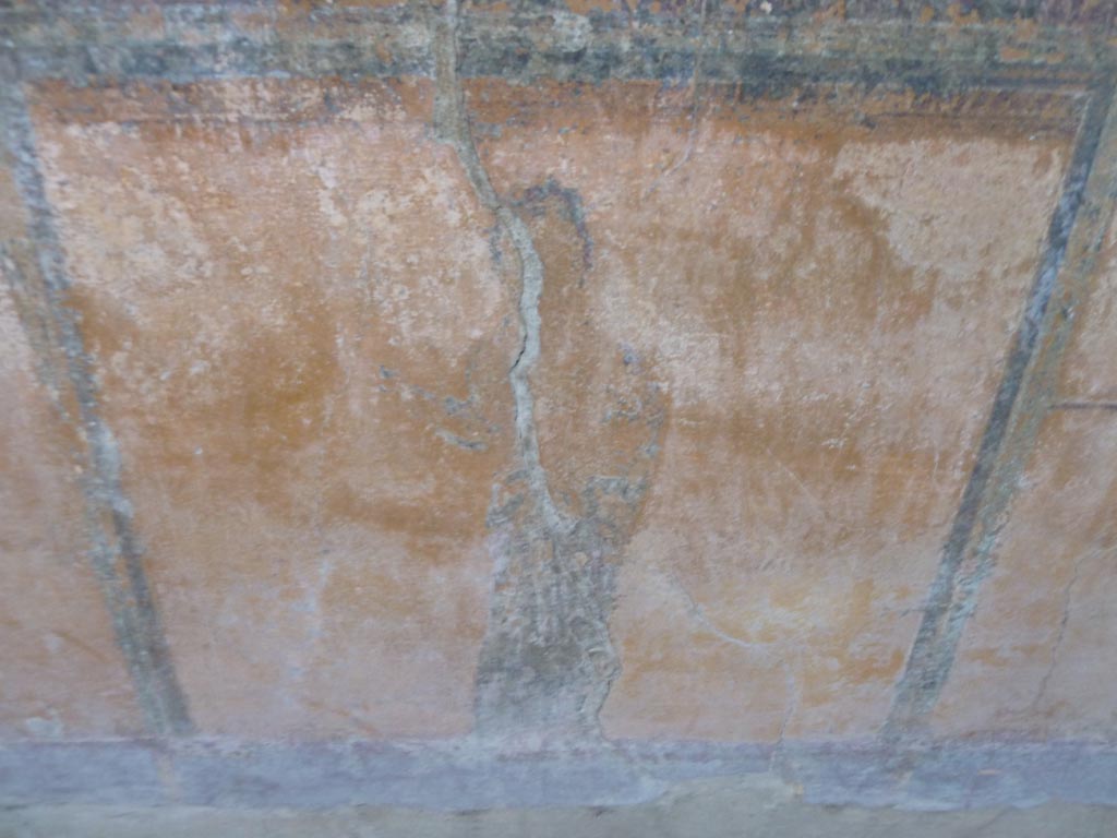 Stabiae, Villa Arianna, September 2015. Room 12, painted figure from zoccolo at north end of west wall under window.