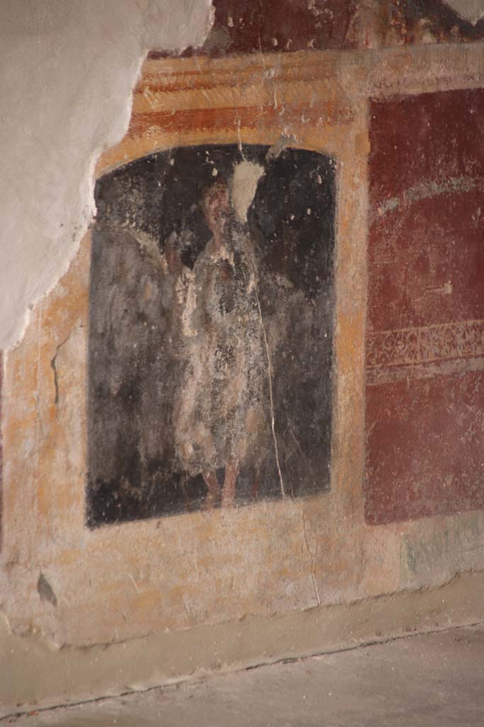 Stabiae, Villa Arianna, October 2020. Room 3, detail of painted figure on zoccolo at south end of east wall. Photo courtesy of Klaus Heese.