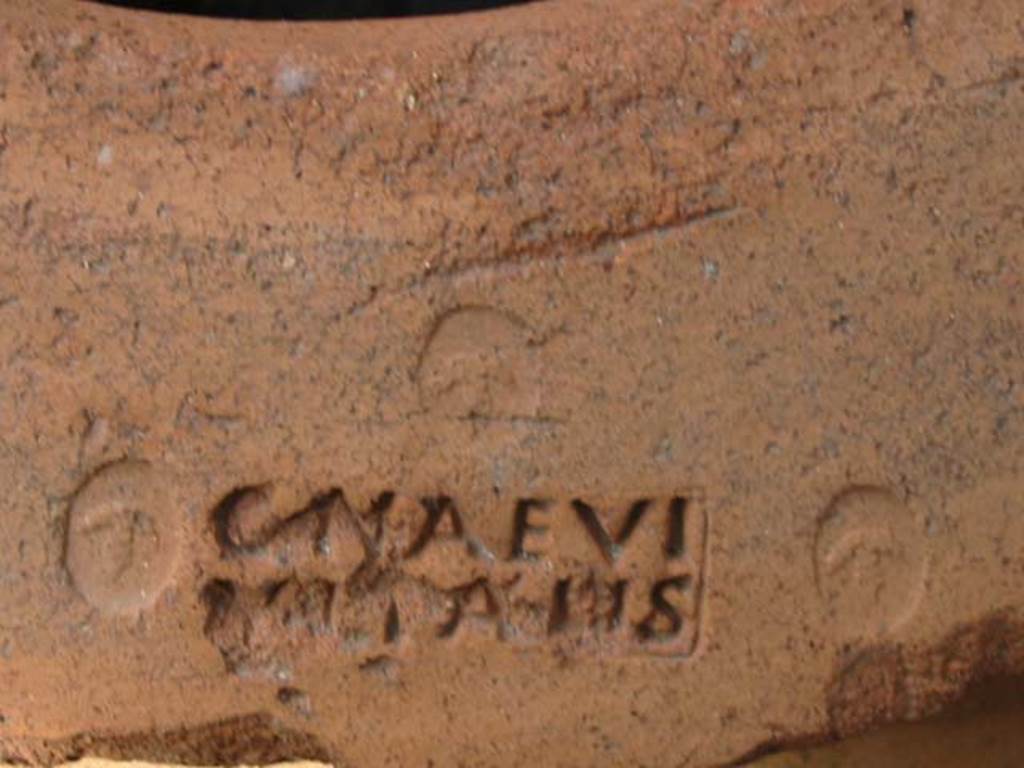 VI.14.35/36. May 2003. Stamp from terracotta pot. Photo courtesy of Nicolas Monteix.