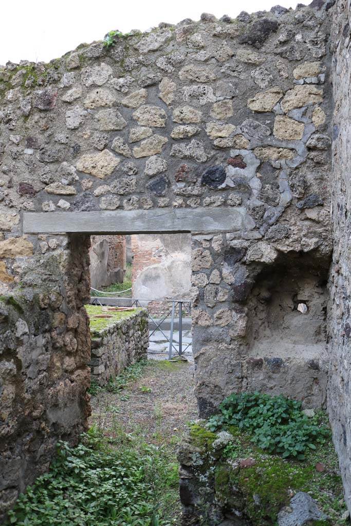 VI.14.36 Pompeii. December 2018.
West wall of kitchen, with recess/niche above hearth in north-west corner. Photo courtesy of Aude Durand.