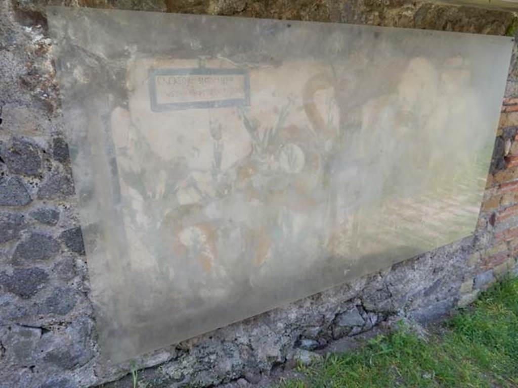 Painted street shrine on the wall at V.6.19. May 2015. Photo courtesy of Buzz Ferebee.
