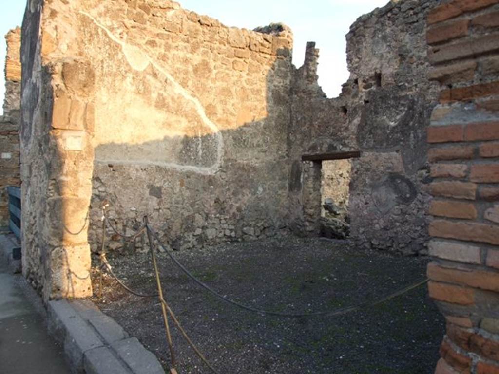 I.4.17 Pompeii. December 2007. East wall of shop-room.  In March 1858, on the pilaster between I.4.18 and 17, painted graffiti in red and black letters, was found:

Romanum   [CIL IV 1031]

M(arcum)  Epidium […]
defensorem    [CIL IV 1032] 

See Pagano, M. and Prisciandaro, R., 2006. Studio sulle provenienze degli oggetti rinvenuti negli scavi borbonici del regno di Napoli..  Naples : Nicola Longobardi. (p.174) 

