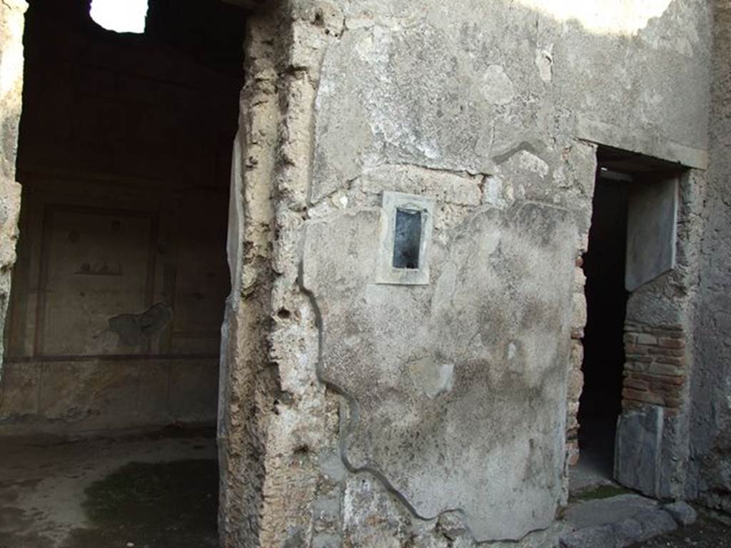 I.7.11 Pompeii. December 2006. Doorways to cubiculum and triclinium to east of atrium.