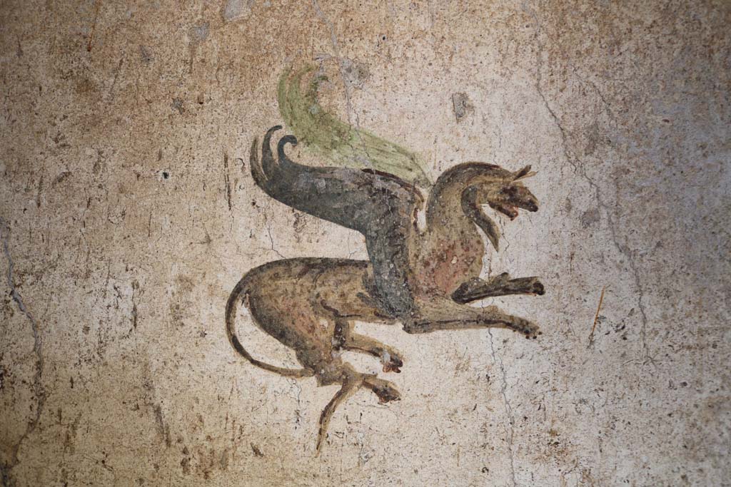 I.7.11 Pompeii. December 2018. Painting in centre of north panel on east wall. Photo courtesy of Aude Durand.