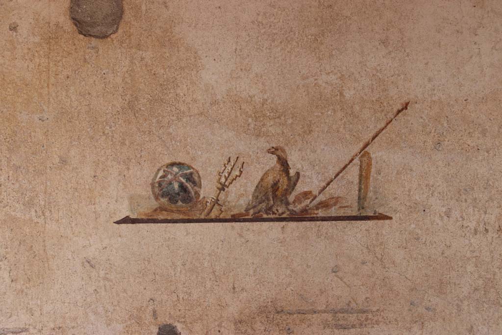 I.7.11 Pompeii. September 2021. 
Wall painting of the attributes of Jupiter, from centre panel of east wall in cubiculum. Photo courtesy of Klaus Heese.
