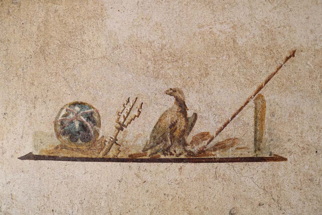 I.7.11 Pompeii. December 2018. 
Wall painting of the attributes of Jupiter, from centre panel of east wall in cubiculum. Photo courtesy of Aude Durand.
