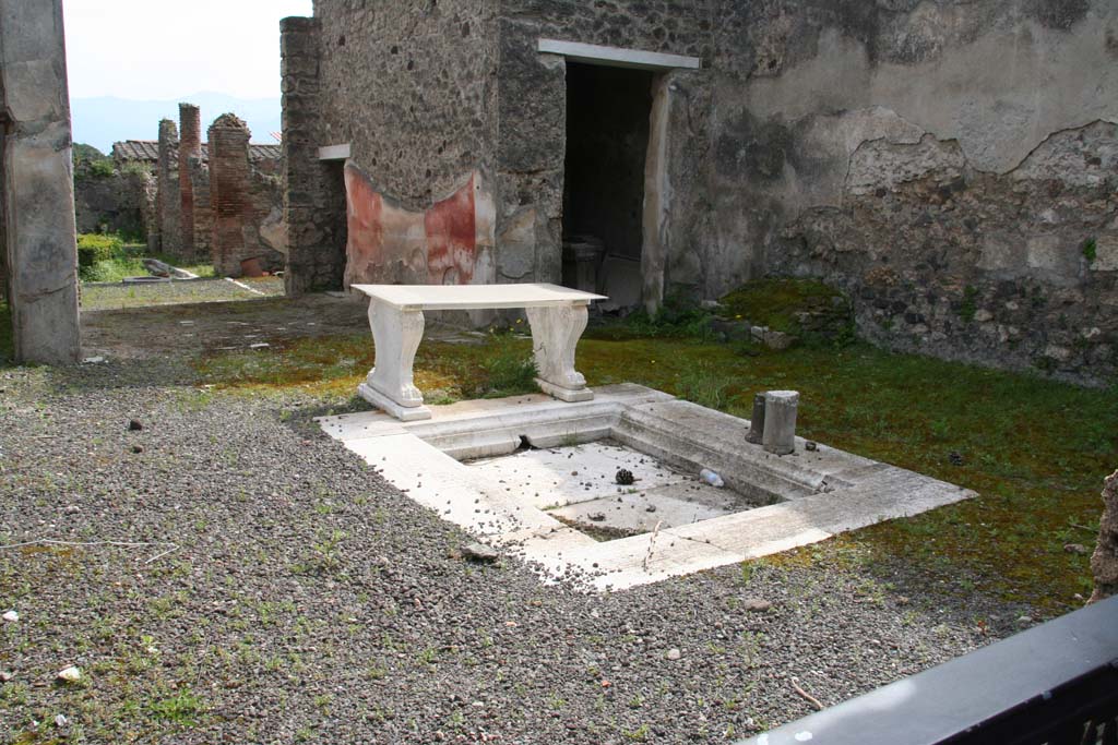 I.8.5 Pompeii. April 2013. Looking across atrium towards tablinum and garden area. Photo courtesy of Klaus Heese.