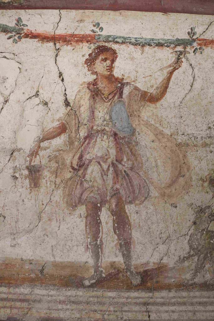 I.8.8 Pompeii. December 2018. Detail of Lar from west side of Genius. Photo courtesy of Aude Durand.