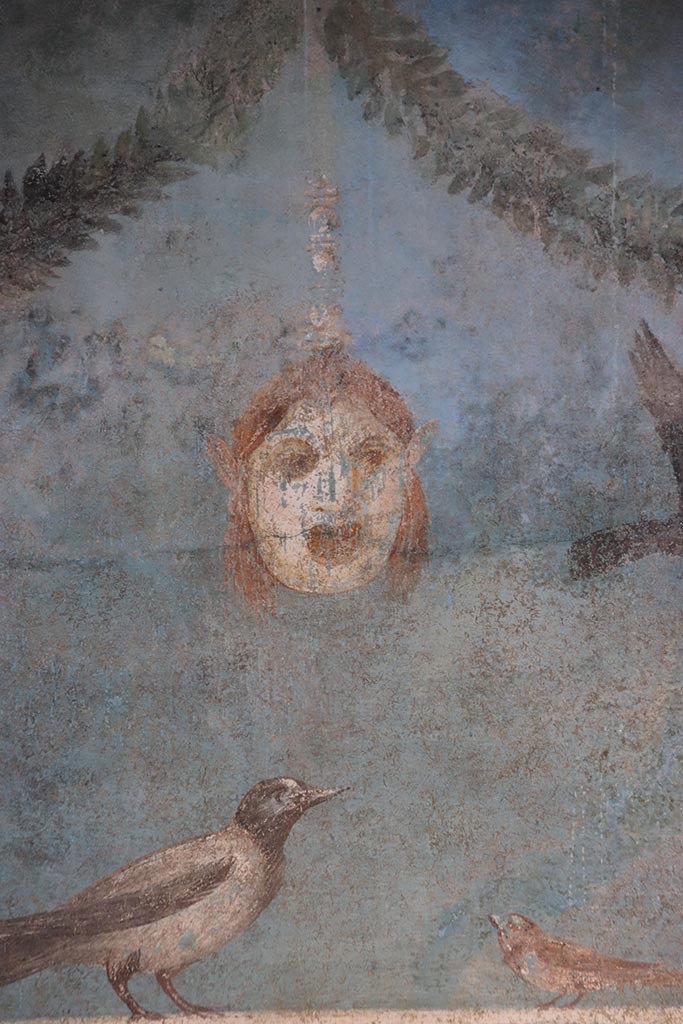 I.9.5 Pompeii. October 2024. 
Room 5, detail from centre of upper east wall. Photo courtesy of Klaus Heese
