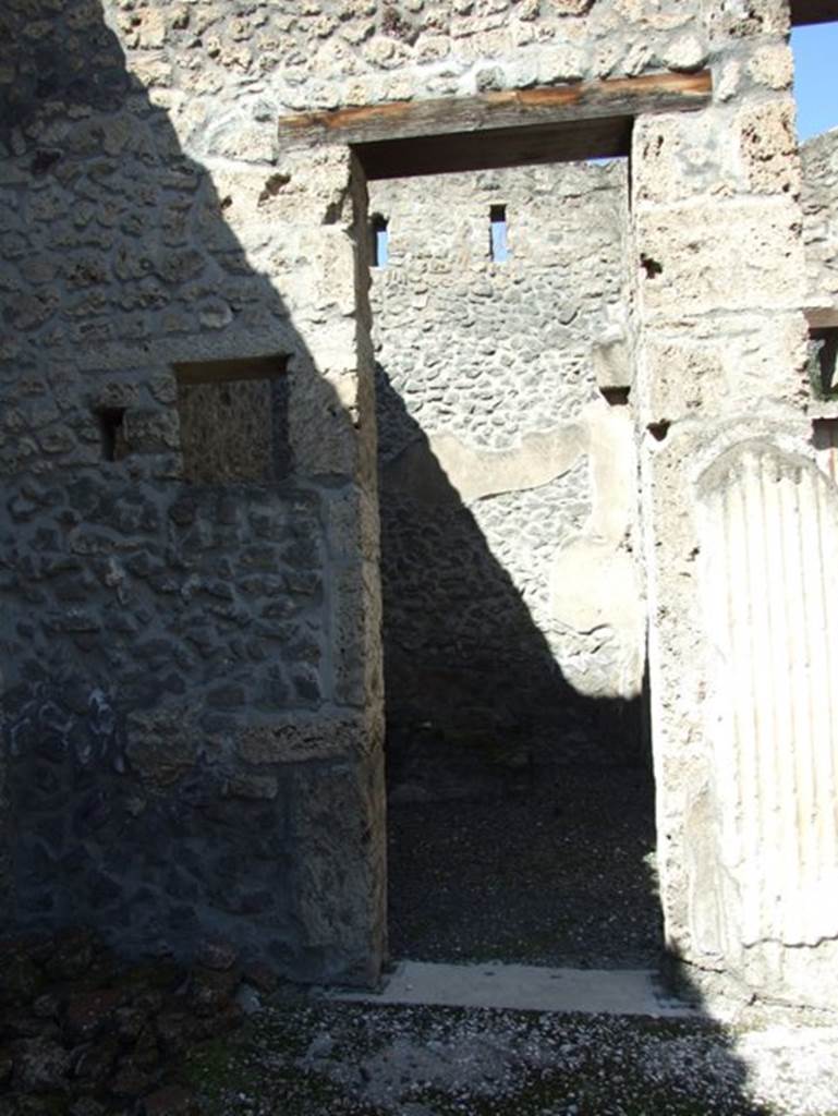 I.9.5 Pompeii. March 2009. Room 3.  Atrium.  Doorway to room 2 in north west corner.