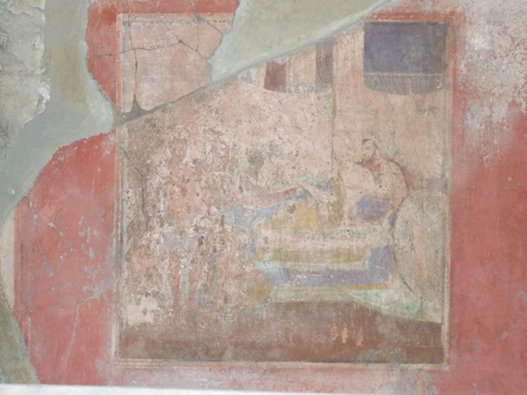 I.10.7 Pompeii. March 2009. Room 8, wall painting of the Sacrifice of Sophonisba, a banqueting scene, from north wall.
According to NdS 
Of the three paintings which decorated the walls of this room, the one from the east wall was completely ruined by the fall of the wall,
the one from the west wall was strongly deteriorated, the only one found in a good condition of conservation was the one from the north wall.
See Notizie degli Scavi, 1934, p.282.
