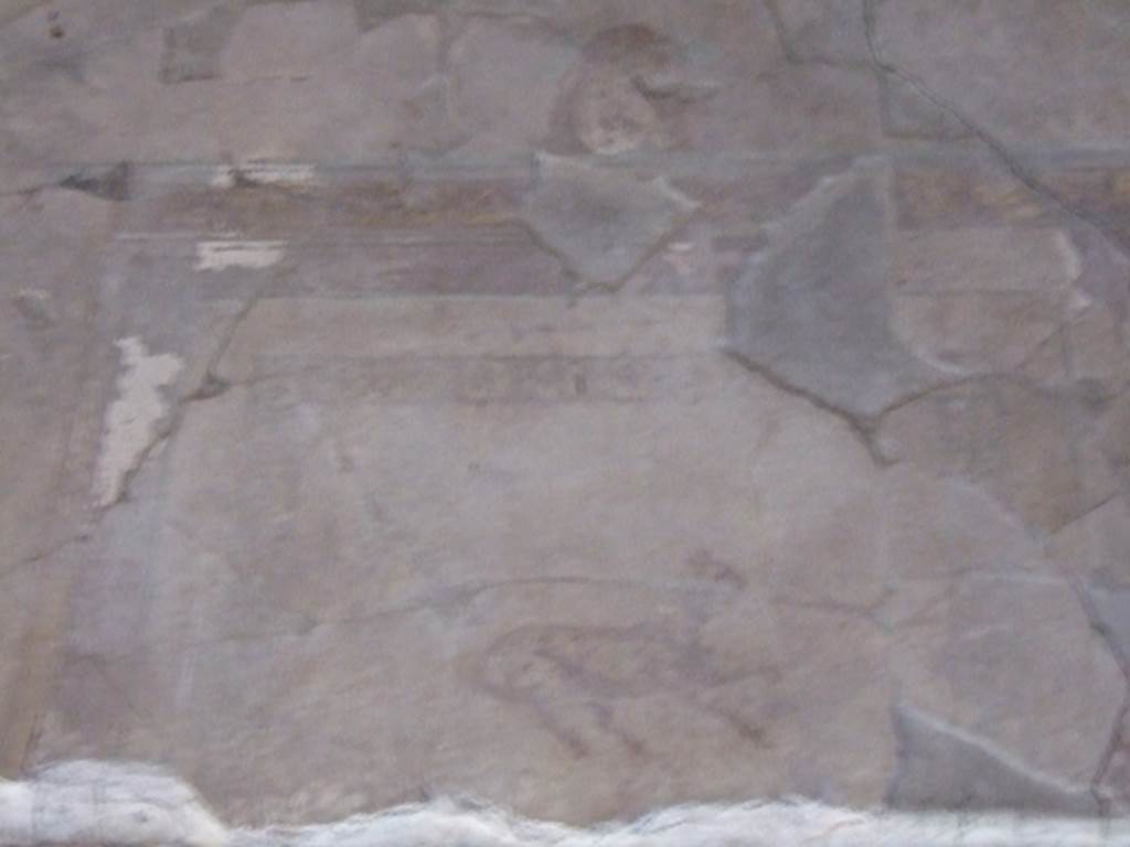 I.10.11 Pompeii.  March 2009.  Room 12.  Cubiculum.  West wall.  Centre above door.  Painting of a goat? and mask.